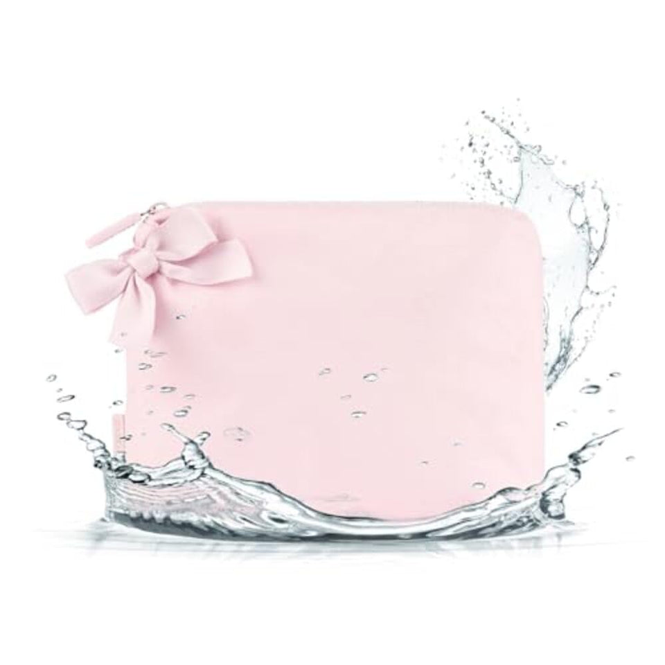 Case-Mate crinkle bow makeup bag in ballet pink for travel organization.