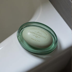 Caswell-Massey Greenbriar soap lathering, moisturizes skin.
