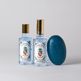 Caswell-Massey Newport bottle closeup with gold cap, premium design.