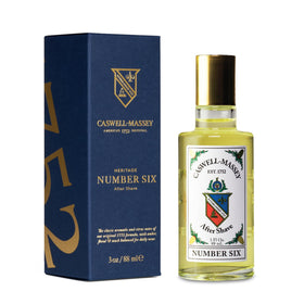 Caswell-Massey Number Six gold-cap bottle aftershave for refreshed skin after shaving.