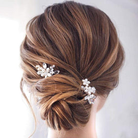 Catery flower bridal hair pin in silver with pearl and crystal beads.