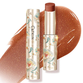 Catkin glossy lip balm tube close-up delivers radiant shine for hydrated lips.