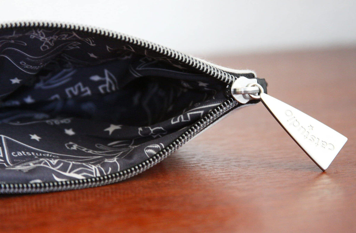 Catstudio Auburn University zipper pouch size 5x7 inches, fits travel toiletries and coins.