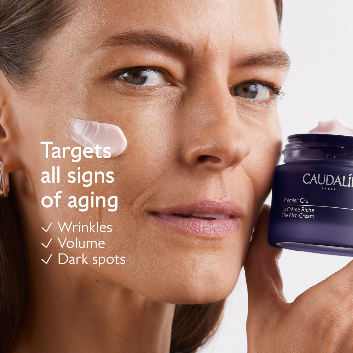 Caudalie Premier Cru Eye Cream tube targeting puffiness and dark circles.