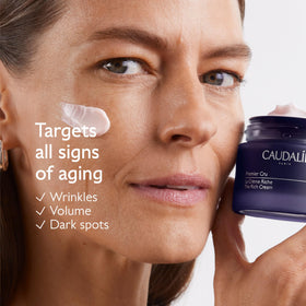 Caudalie Premier Cru Eye Cream tube targeting puffiness and dark circles.