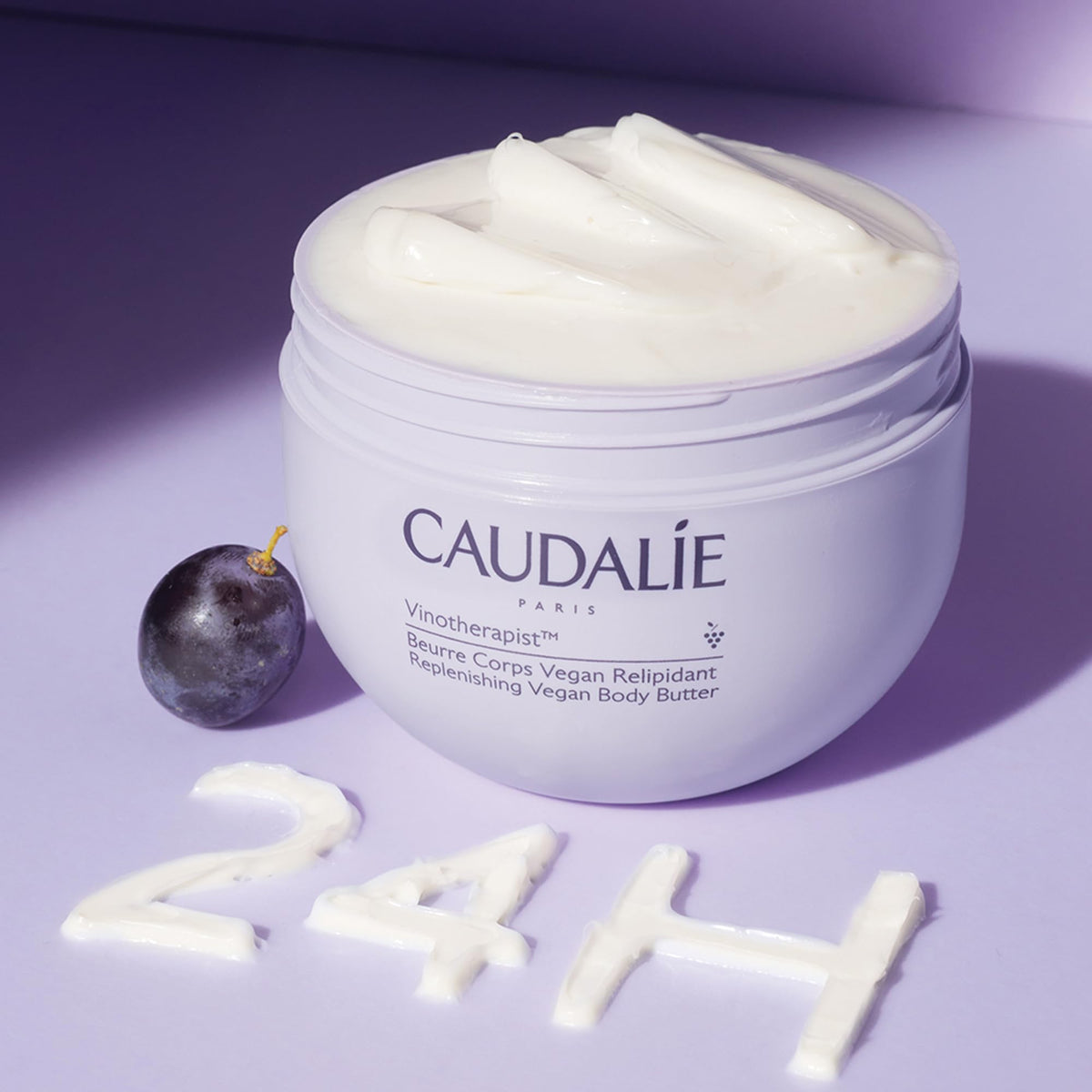 Shea butter component emphasized for deep hydration in Caudalie balm.