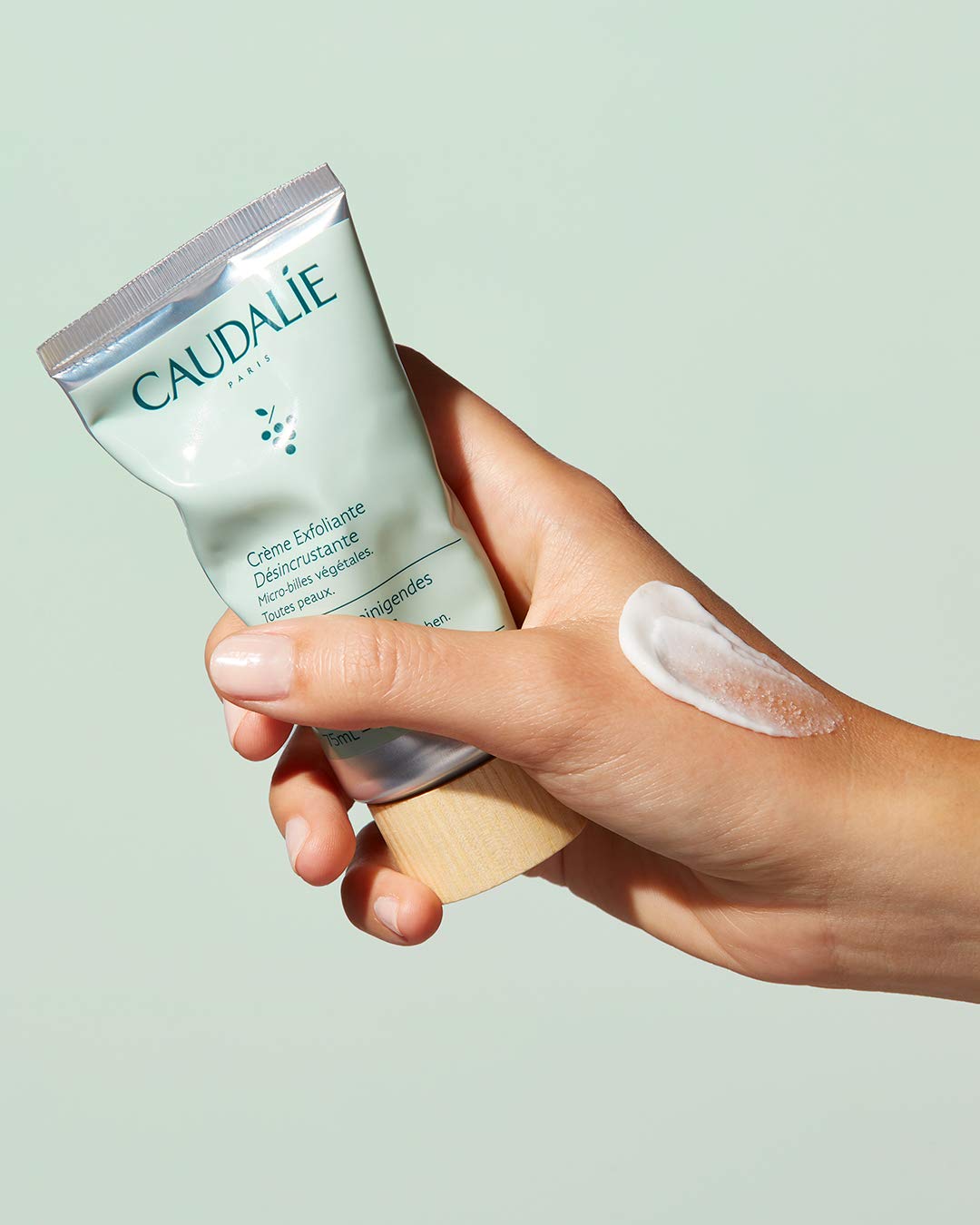 Caudalie Vinoclean Deep Cleansing Exfoliator in use delivering a refreshing T-zone massage