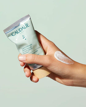Caudalie Vinoclean Deep Cleansing Exfoliator in use delivering a refreshing T-zone massage
