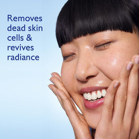 Vinoperfect Brightening Essence application on clean skin for gentle exfoliation.