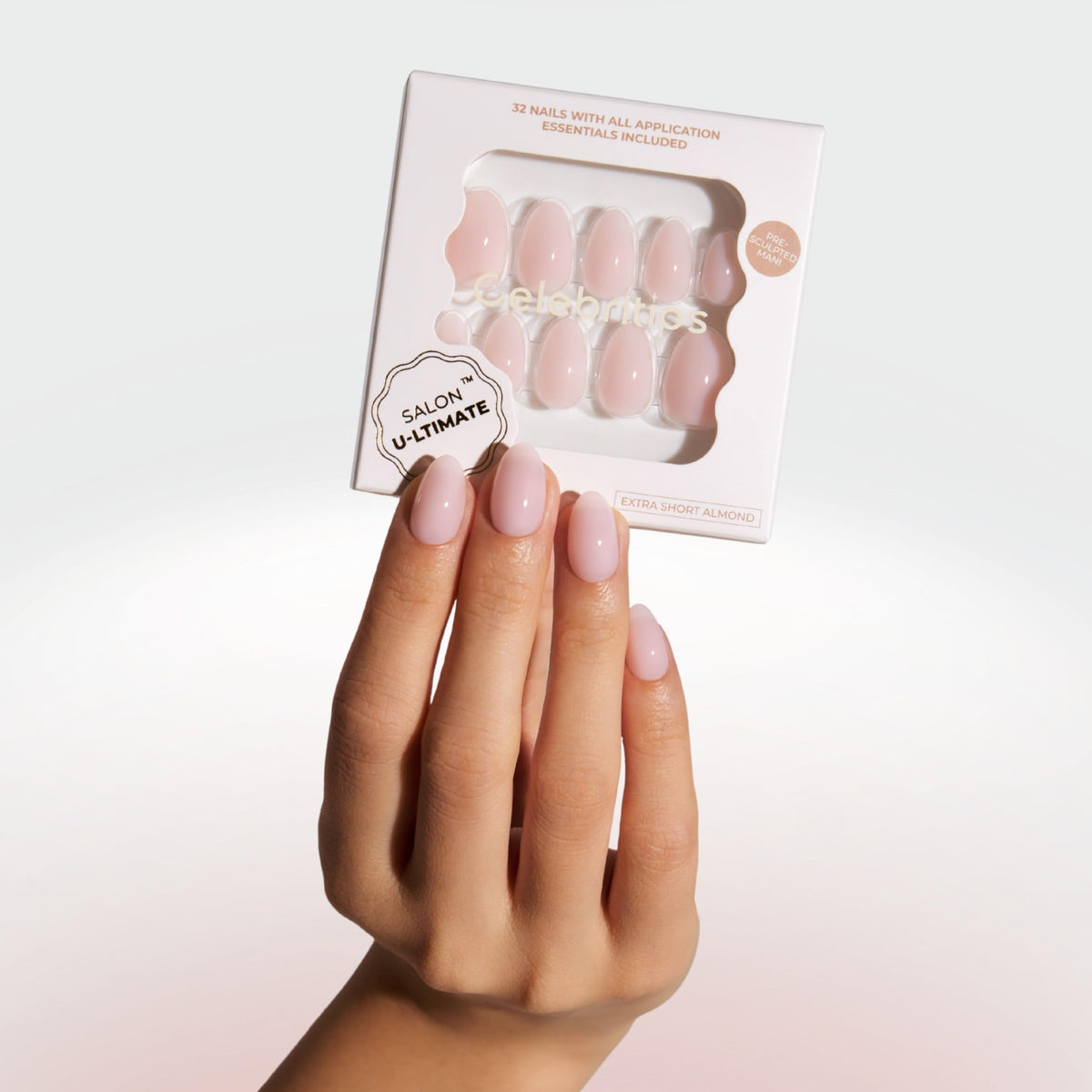 Celebritips Salon U-ltimate Bare Milk extra-short almond nails on hand for quick, natural-looking length.
