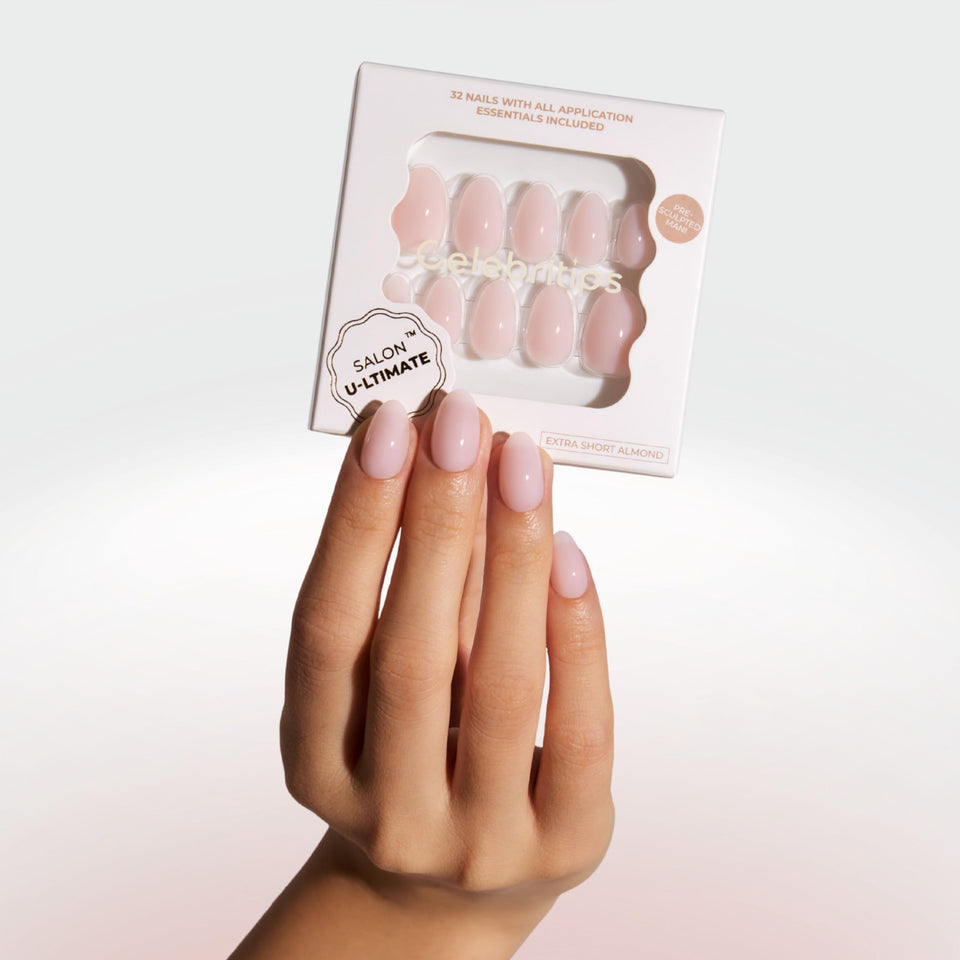 Celebritips Salon U-ltimate Bare Milk extra-short almond nails on hand for quick, natural-looking length.