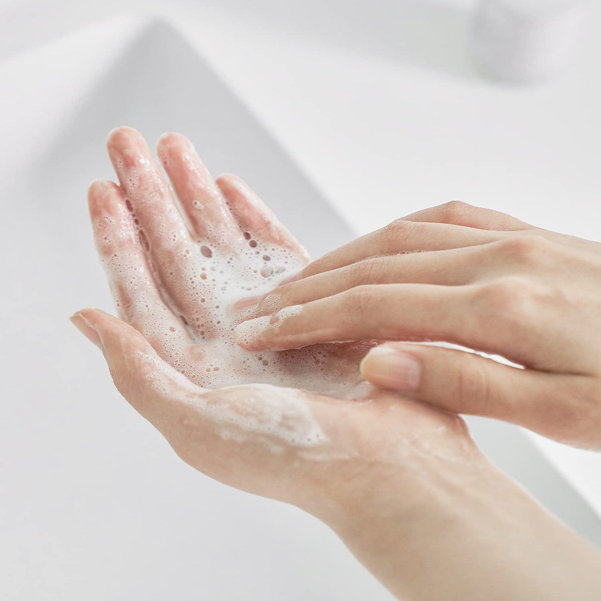 Close-up of rich silky lather from Celimax cleanser highlighting moisturizing texture.