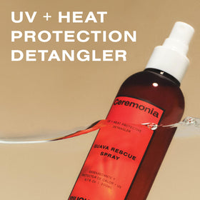 Ceremonia Guava Rescue Spray UV shield on hair strands for sun and blue-light defense.