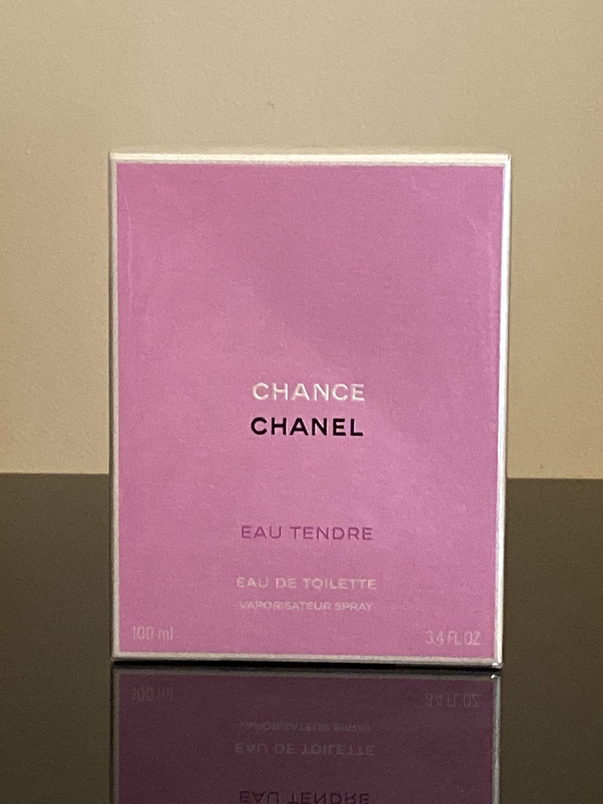 Chanel Chance Eau Tendre bottle front view, soft pink tones for everyday elegance.