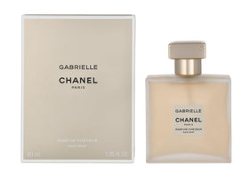 CHANEL Gabrielle Cheveux perfume bottle on a vanity, timeless scent for daily elegance.