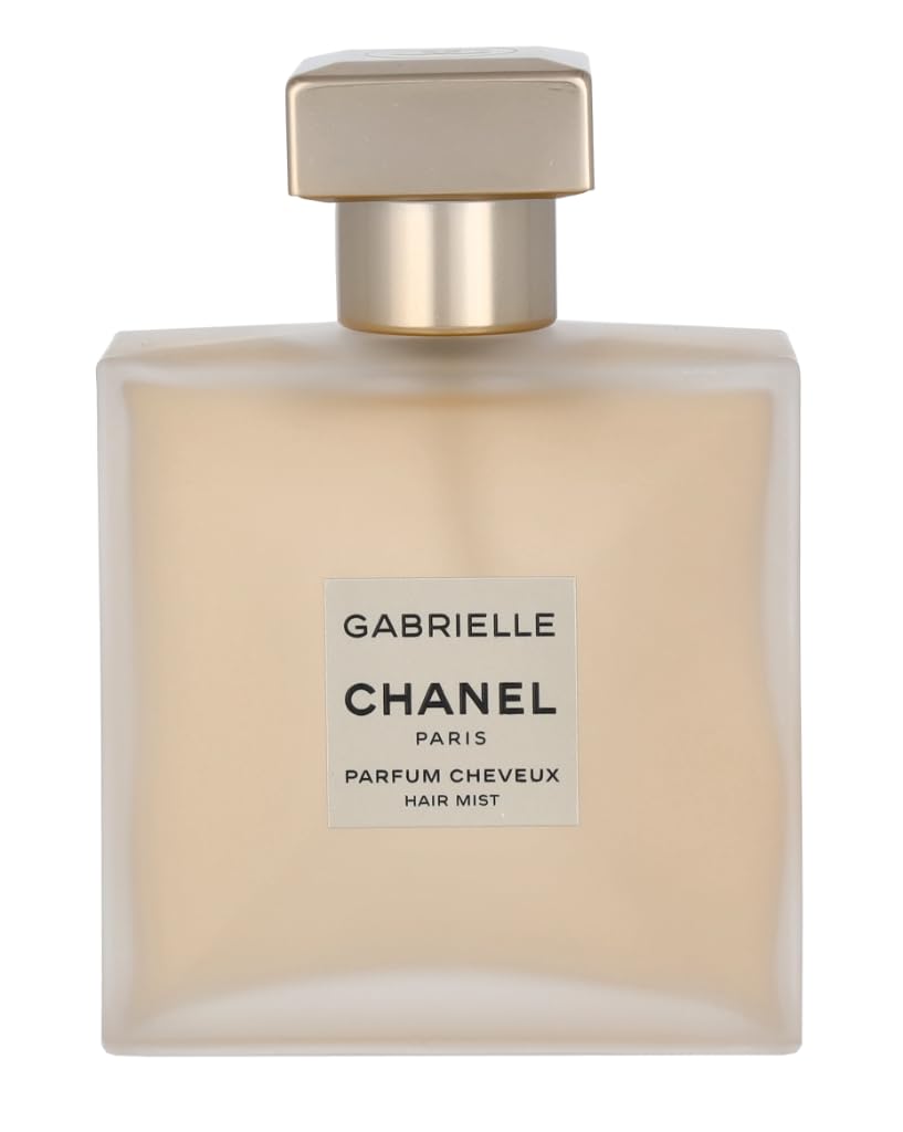 CHANEL Gabrielle Cheveux perfume spray close-up, diffusing elegant notes with every mist.