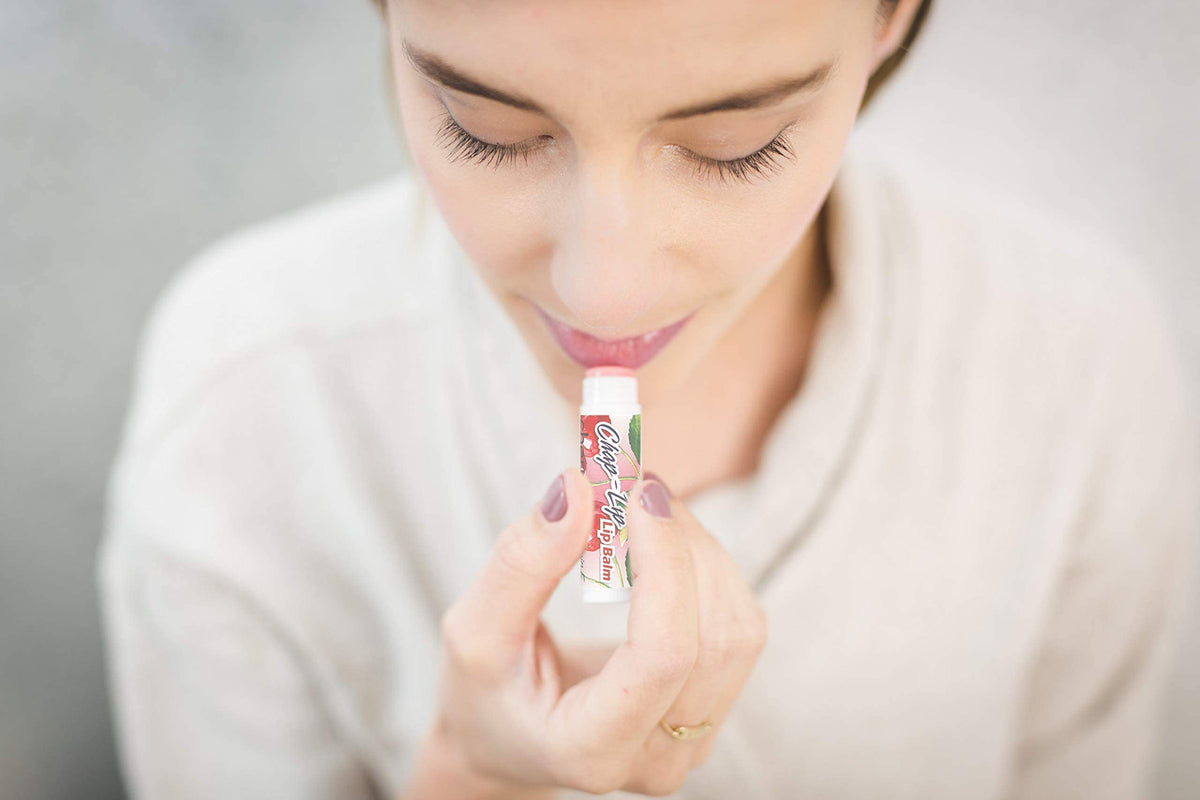 Chap-Lip Lip Balm cherries flavor tube demonstrates quick, non-greasy glide and soothing hydration.