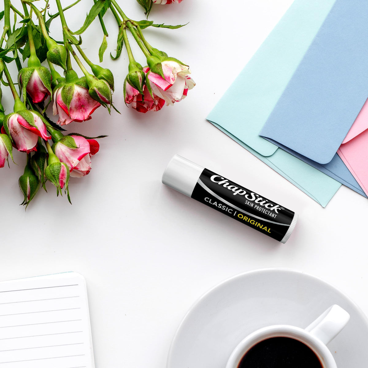 ChapStick daily-use lip balm in use for dry lips relief and base under color.