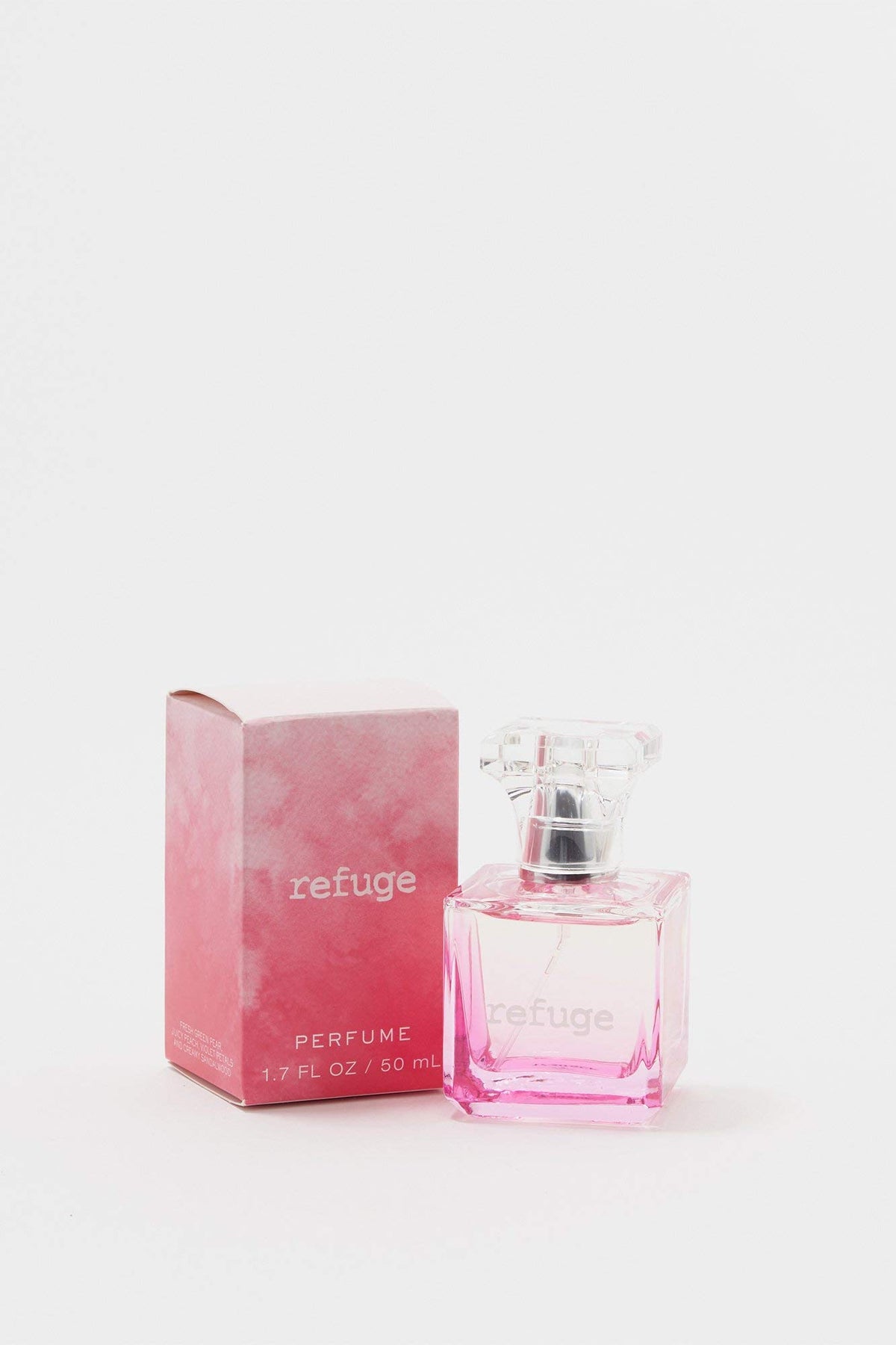 Charlotte Russe Refuge Perfume bottle close-up, highlighting refined packaging and gifting appeal.