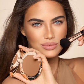 Charlotte Tilbury Airbrush Matte Bronzer hydrating formula showing silky texture for comfortable wear.