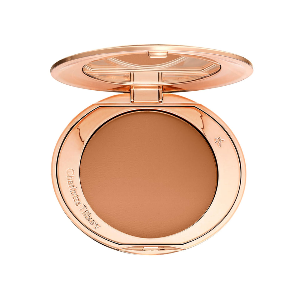 Charlotte Tilbury Airbrush Flawless Finish Powder compact close-up showing pore-blurring texture.