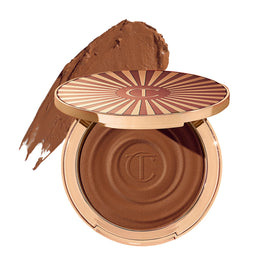 Charlotte Tilbury Beautiful Skin bronzer bottle close-up showing hydrating glow
