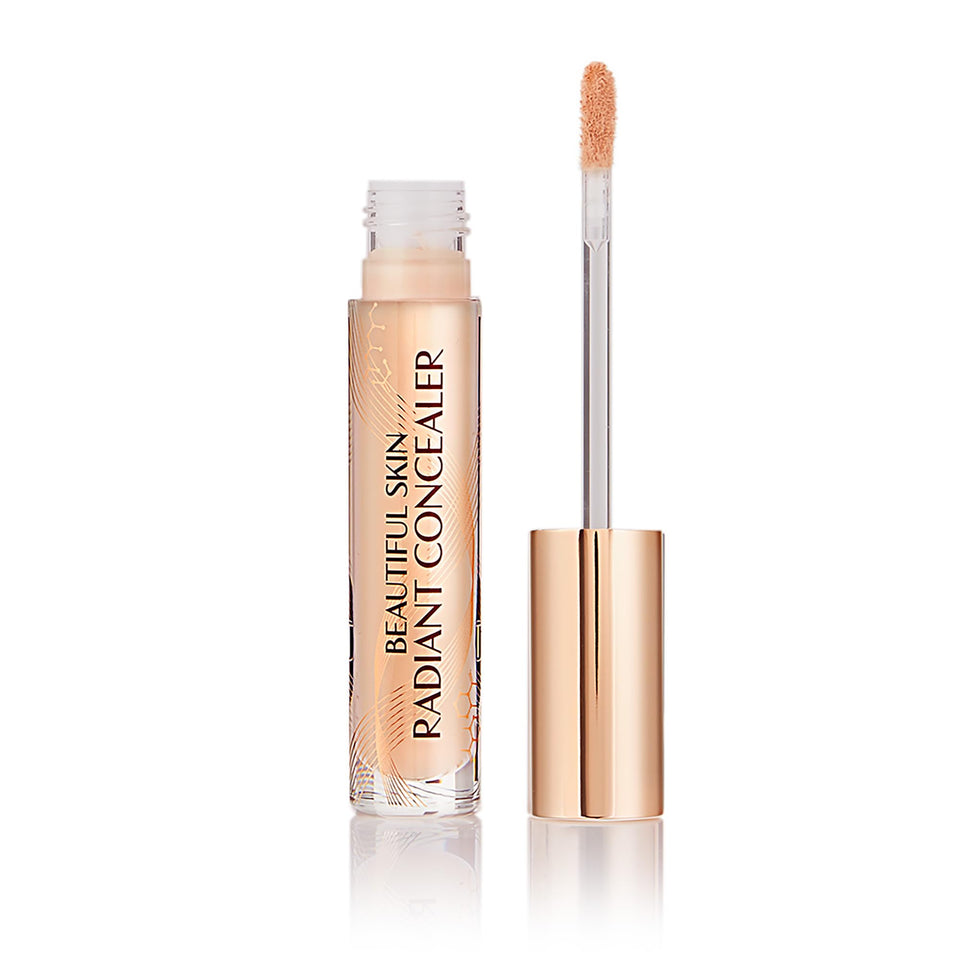 Charlotte Tilbury Beautiful Skin Concealer packaging showcases premium formula and radiant finish.