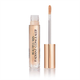 Charlotte Tilbury Beautiful Skin Concealer under-eye tube showing a silky, radiant finish