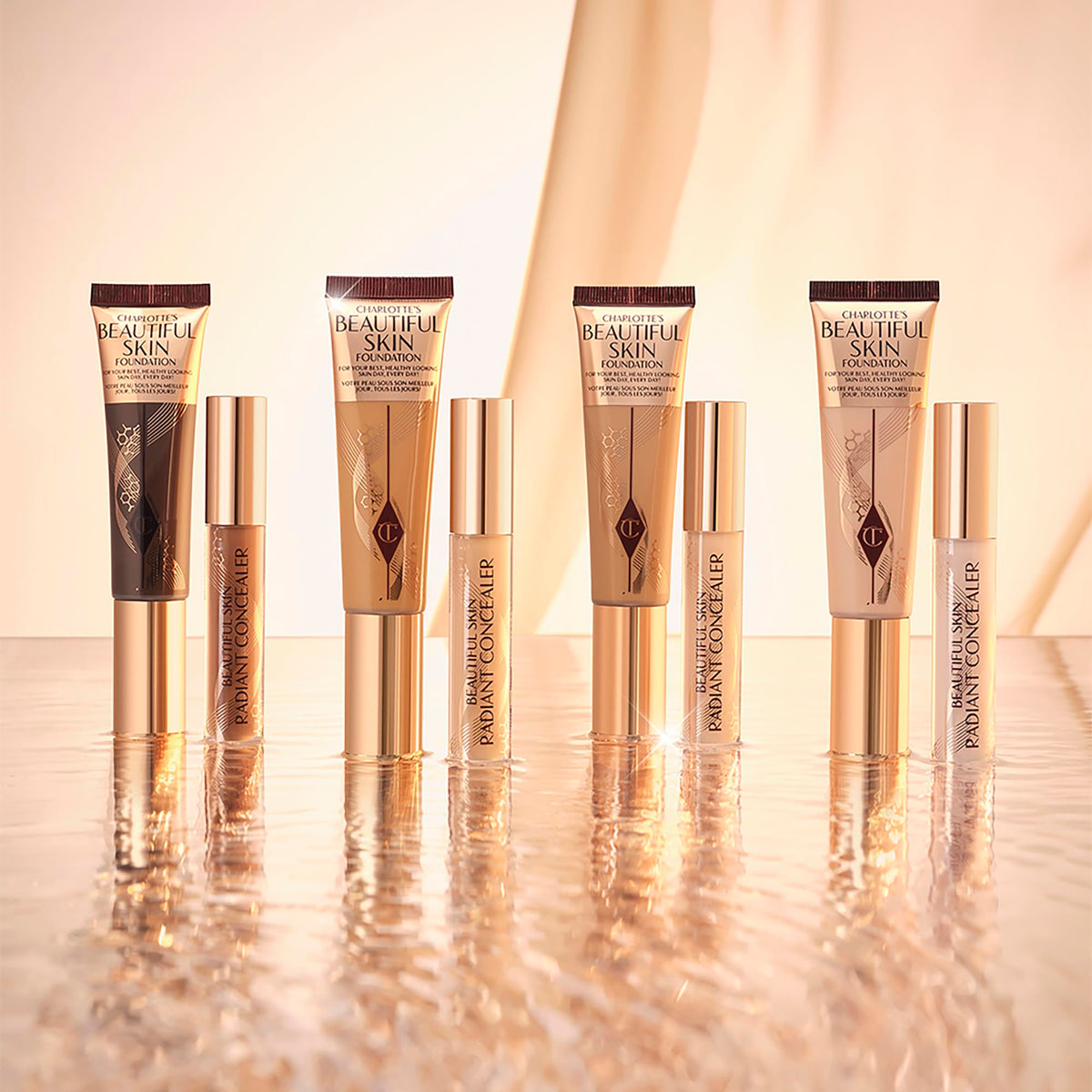 Charlotte Tilbury Beautiful Skin 3 Cool apply on face demonstrates hydrated glow.