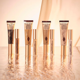 Charlotte Tilbury Beautiful Skin 3 Cool apply on face demonstrates hydrated glow.