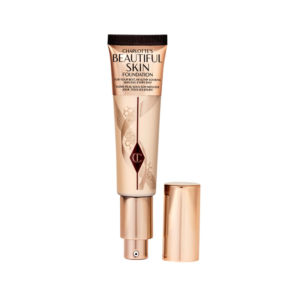 Charlotte Tilbury Beautiful Skin Foundation bottle glowing with radiant finish.