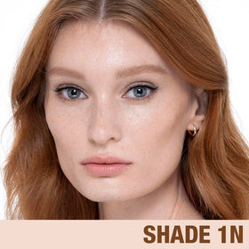 Charlotte Tilbury Beautiful Skin Foundation model wearing shade 1 Neutral.