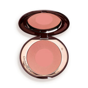 Charlotte Tilbury Cheek to Chic Ecstasy outer shade shapes and warms cheeks with glow