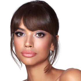 Charlotte Tilbury Love Glow palette closeup showing two-tone blush detail.