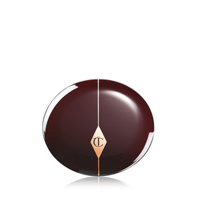 Charlotte Tilbury Pillow Talk Deep Light-Flex glow with crushed pearls for luminous skin.