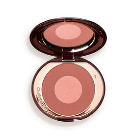 Charlotte Tilbury Pillow Talk Deep outer and inner shades sculpt cheeks with radiant warmth.