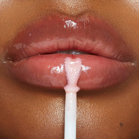 Charlotte Tilbury Collagen Lip Bath closeup highlighting pearlescent glow.