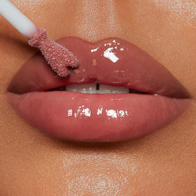 Charlotte Tilbury Collagen Lip Bath gloss close-up highlights luminous shine