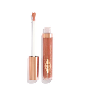 Charlotte Tilbury Collagen Lip Bath tube showcases a radiant, plump-looking gloss for hydrated lips