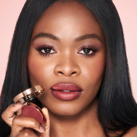 Cheek swatch builds glow with creamy texture and easy blending
