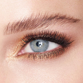 Charlotte Tilbury Eyes to Mesmerize Amber Gold application demonstrates a smooth glide and long wear.