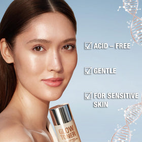 Milky texture of Glow Toner on skin suggesting gentle hydration from Charlotte Tilbury.