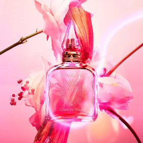 Charlotte Tilbury Joyphoria mini bottle pour for uplifting warmth.