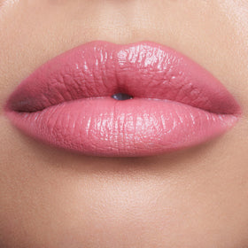Lipstick Tree Extract in Kissin-g formula conditioning lips