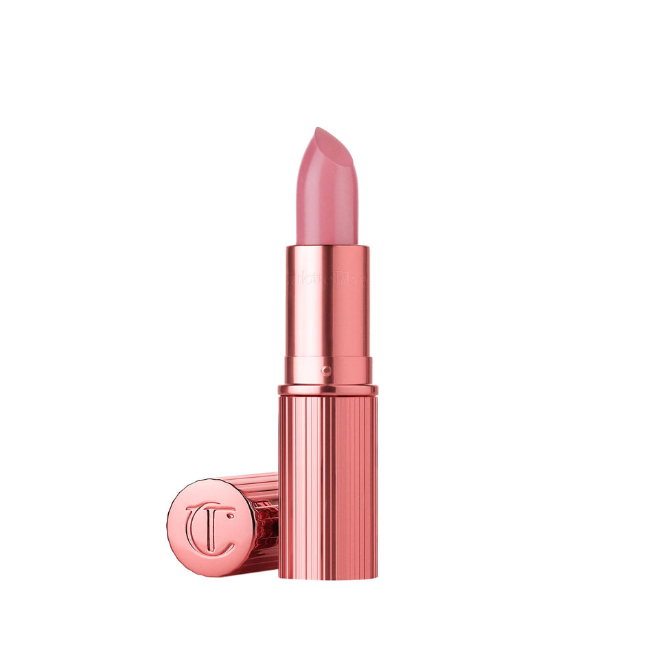 Charlotte Tilbury Kissin-g lipstick in Red Carpet Pink with satin glow for a luminous pout