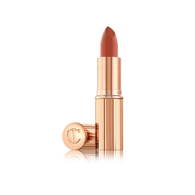 Charlotte Tilbury K.I.S.S.I.N.G Lipstick Stoned Rose close-up bullet showing creamy moisture and luminous finish.