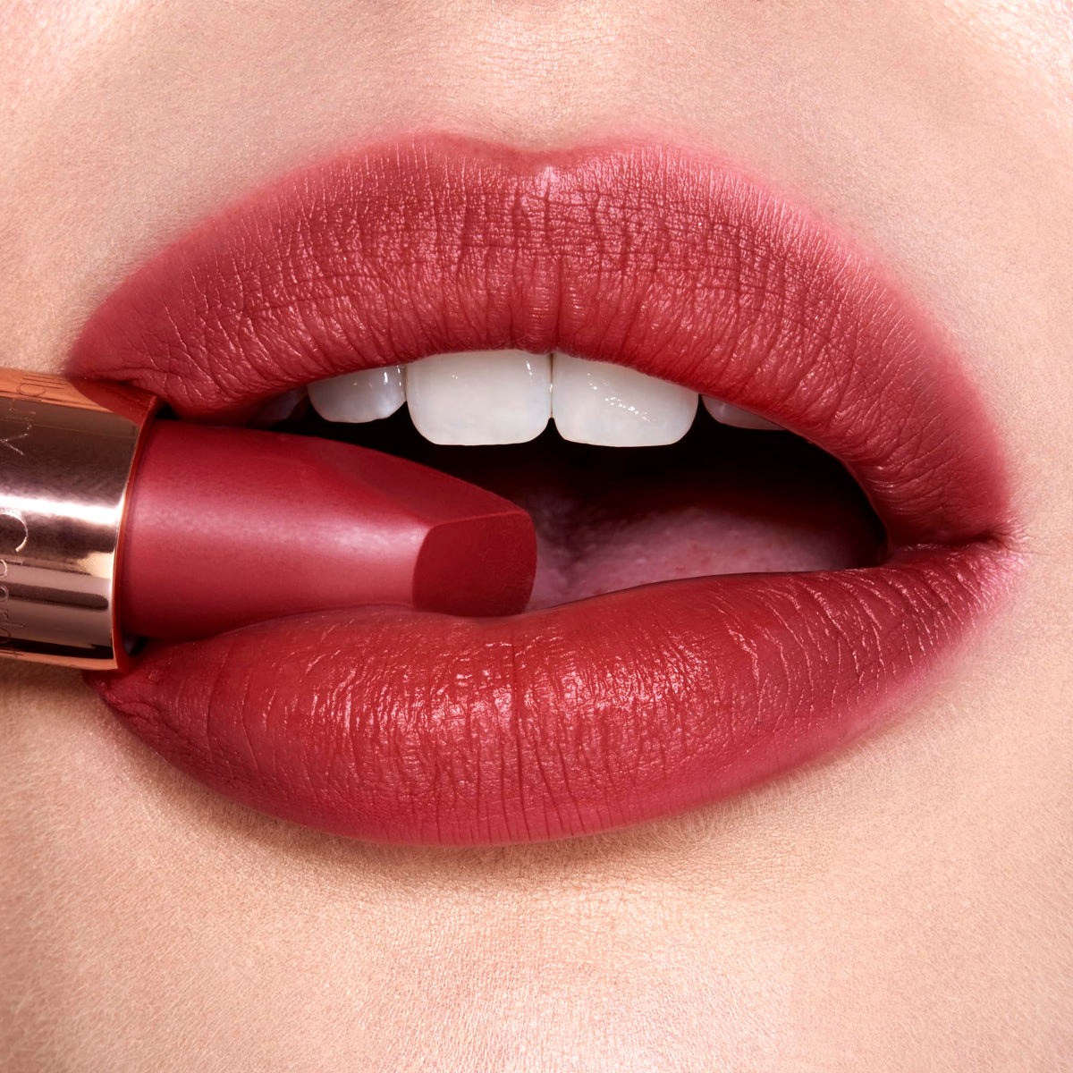 Charlotte Tilbury Lip Cheat liner application demonstrating lip contour and fullness prep.