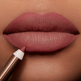 Natural berry M.I Kiss shade as nude-pink lip base for versatility