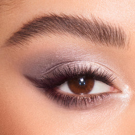 Uptown Girl smoky grey swatch by Charlotte Tilbury for evening depth