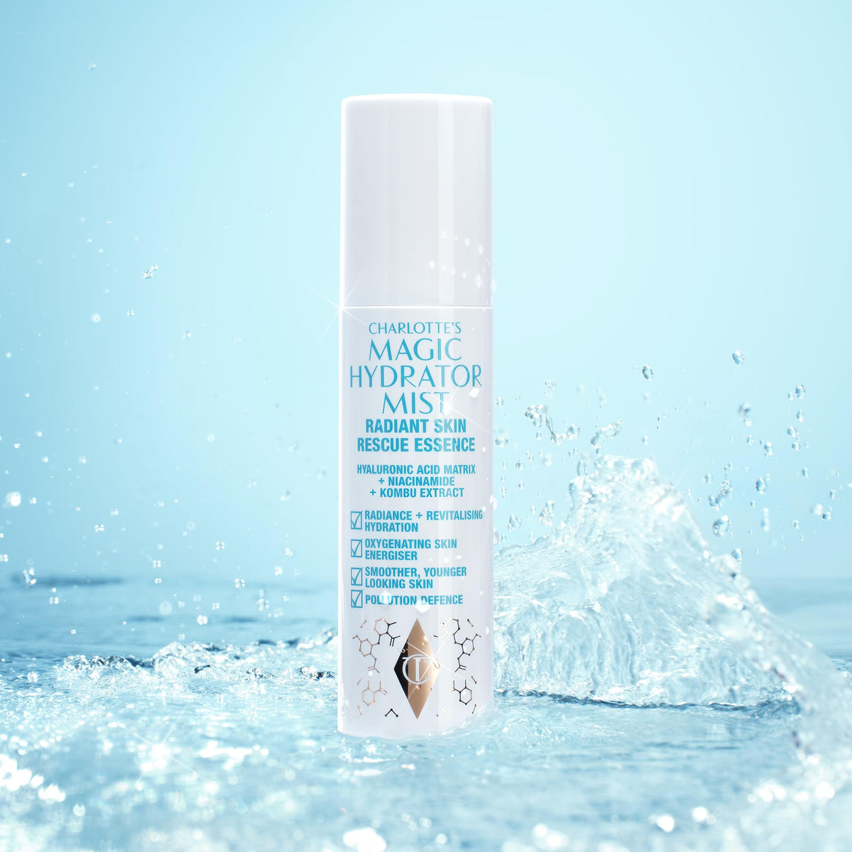 Charlotte Tilbury Magic Hydrator Mist used over makeup for dewy setting.
